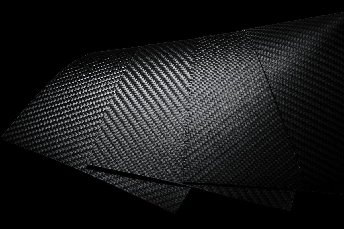 Carbitex CX6 flexible carbon fiber sheets landscape macro — COLDFIRE wallet structural shell